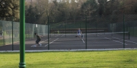 The tennis court.